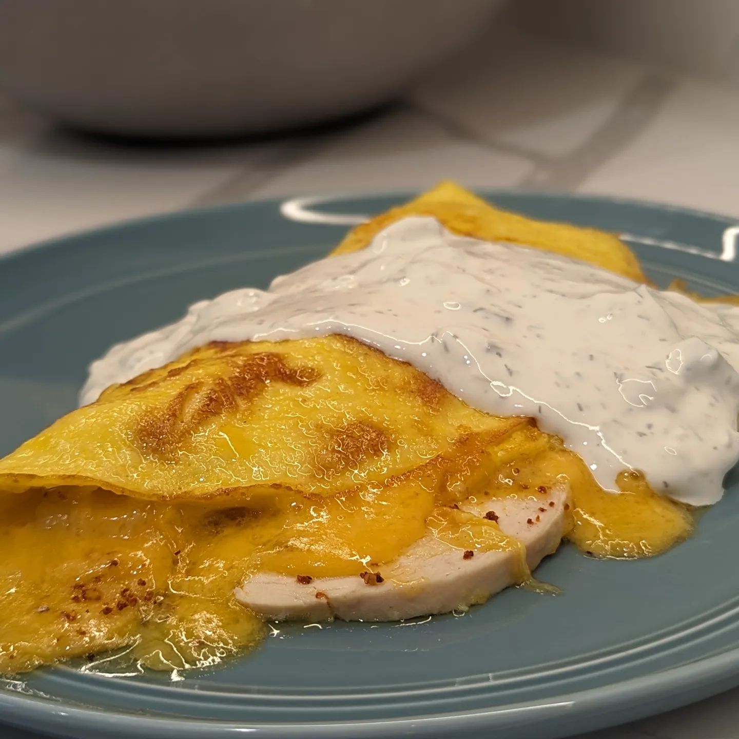 Two days, two omelettesFirst one is chicken breast and cheddar. Topped with tzatziki.Second one is roast beef. Jalapeno artichoke dip and havarti cheese. Omelettes are something I eat multiple times a week! Easy to make, easy to be creative and loaded with nutritional value!