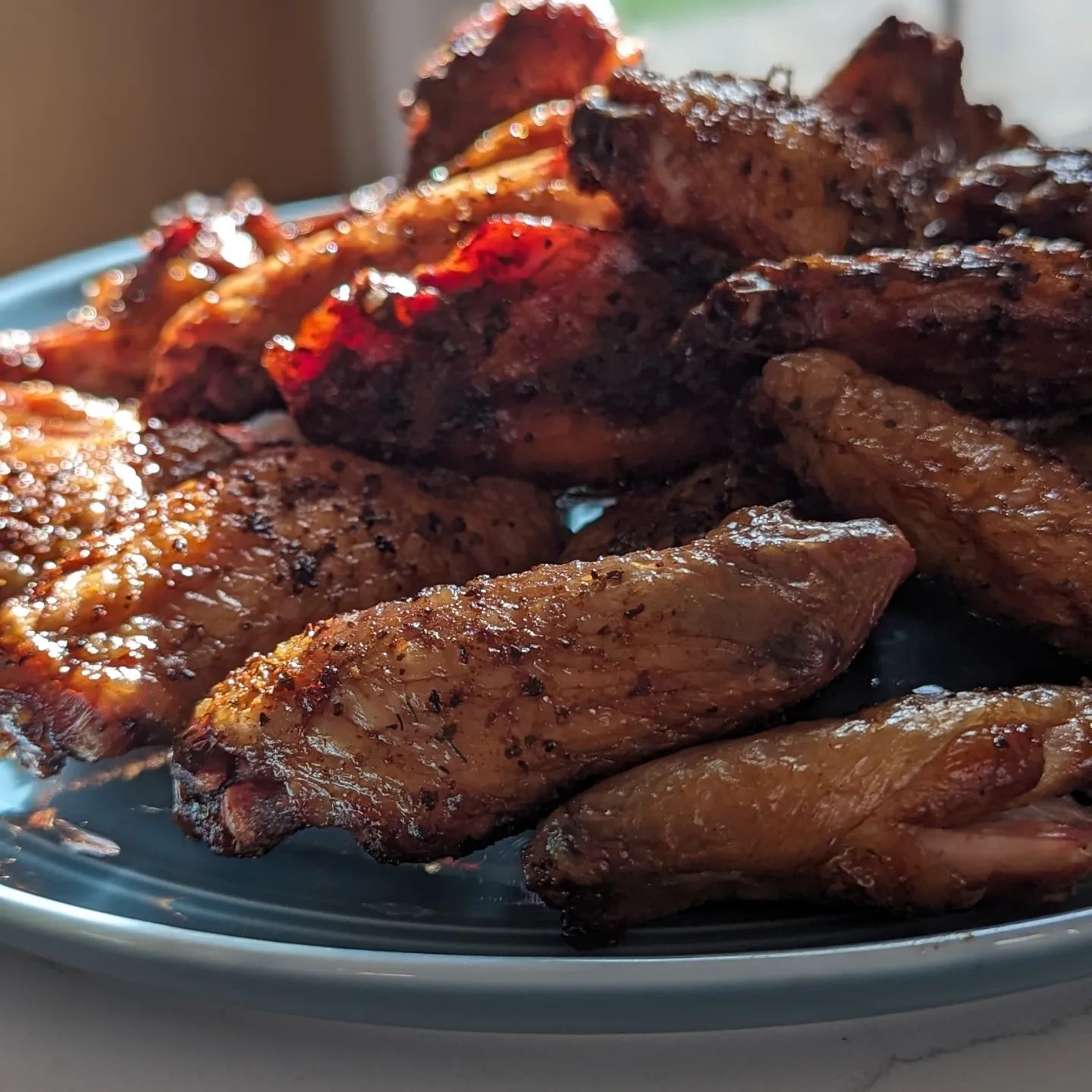 Wing Wednesday! Lemon pepper pickle wings!Yes you read that right! I brined these wings in @grillospickles pickle juice and @neilsarap gourmet lemon pepper seasoning. Then gave them a light dusting of more lemon pepper rub.They smoked at 180 degrees till cooked through at 165 and then bumped the temp up to 375 to get them nice and crispy with a finish temp of 200 internal. Smoked using @bearmountainbbq bourbon blend and man oh man was it amazing. The low and slow smoke in conjunction with the brine was perfect. #chickenwings #wingwednesday #wingcrushwednesday #bearmountainbbq #pickle #lemonpepper