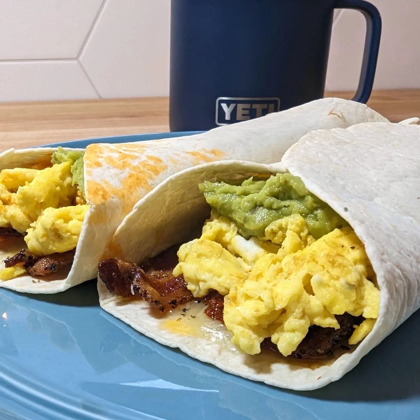 Breakfast Burritos have a special place in my heart.These @latortillafactory 0net carb tortillas were loaded up with scrambled eggs, @cabotcreamery cheddar cheese. Home cured bacon, @caciquefoods pork chorizo and @eatwholly avocado. I seasoned the eggs with @redmondrealsalt seasoning salt and a dash of heavy cream. The avocado was seasoned with @spiceology guac and roll. A latte on the side and my morning is off to a great start! #breakfastburrito #chorizo #chorizoburritos #baconeggandcheese #guacamole #avocado #sundaybrunch #sundaybreakfast