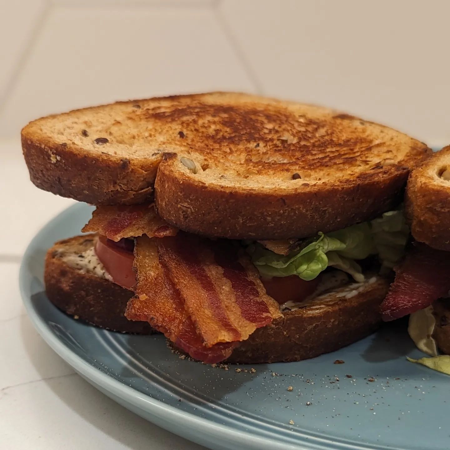 What beats a BLT? Two BLTs! @hero seeded bread, @chosenfoods mayo, fresh cracked black pepper, butter lettuce, tomato and of course my home cured bacon. DM me if you want to learn to make your own bacon, it's life changing to switch from store bought. Simple goodness. #blt #bacon #baconsandwich #freshfood #sandwichoftheday #deliciousfood #eatingfortheinsta